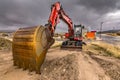 An orange bulldozer at a construction site