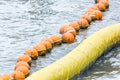 Orange buoy Used in the form of water made from special plastic Royalty Free Stock Photo