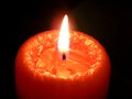 Orange Burning Candle Royalty Free Stock Photo