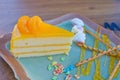 Orange cake with Colorful candy sprinkles on plate