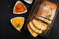 Orange cake with dried apricots and powdered sugar. Royalty Free Stock Photo