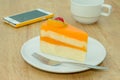 Orange cake with slice kiwi fruit,cherry Royalty Free Stock Photo