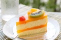 Orange cake and slice kiwi fruit Royalty Free Stock Photo