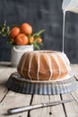 Orange cake on wooden table and dark background Royalty Free Stock Photo