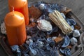 Orange candles with potpourri on an antique metal tray Royalty Free Stock Photo
