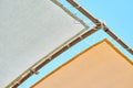 Orange canopy over sun loungers against clear blue sky Royalty Free Stock Photo