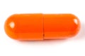 Orange capsule. Macro. Closeup