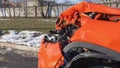 Orange car crash background. Close-up detail of auto wreck. Front side of crashed car from accident. Car accident.