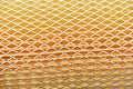 Orange car filter background with iron grille close-up Royalty Free Stock Photo