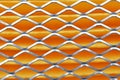 Orange car filter background with iron grille close-up Royalty Free Stock Photo