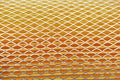Orange car filter background with iron grille close-up Royalty Free Stock Photo