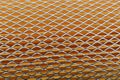 Orange car filter background with iron grille close-up Royalty Free Stock Photo