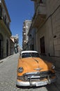Orange car in Old Havana Royalty Free Stock Photo