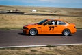 Orange car on race track