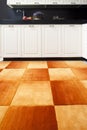 orange carpet in the black and white kitchen Royalty Free Stock Photo