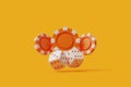 Orange Casino Chips and Dice on Yellow Background Royalty Free Stock Photo