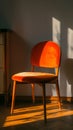 Orange Chair Beside Dresser in Room