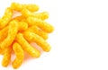 Orange Cheddar Cheese Puffs on a White Background Royalty Free Stock Photo