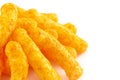 Orange Cheddar Cheese Puffs on a White Background Royalty Free Stock Photo