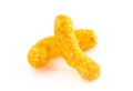 Orange Cheddar Cheese Puffs on a White Background Royalty Free Stock Photo