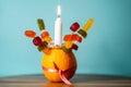 Orange Christingle is a symbolic object used in the Advent, Christmas and Epiphany services of many Christian denominations