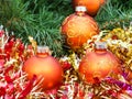 Orange Christmas balls, red tinsel on Xmas tree 3 Royalty Free Stock Photo