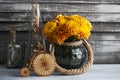 Orange chrysanthemum flowers and wooden bike Royalty Free Stock Photo