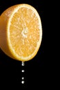 Orange citrus fruit with juice drops