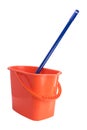 Orange cleaning bucket, with blue MOP inside, on white background Royalty Free Stock Photo