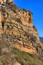 Orange cliffs in stratified subaqueous tuff deposits Royalty Free Stock Photo