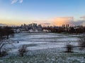 Orange clouds sunset sundown greenwich way path walk park observatory view London city evening trees grass skyline warm Royalty Free Stock Photo