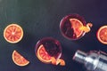 Orange cocktails, toned atmospheric image, with blood oranges and a shaker Royalty Free Stock Photo