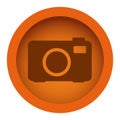 orange color circular frame with silhouette analog camera