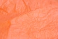 Orange creased paper tissue texture background Royalty Free Stock Photo