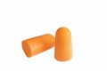 Orange color ear plugs isolated on white background Royalty Free Stock Photo