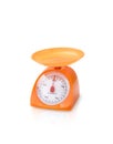 Orange color kitchen scale Royalty Free Stock Photo