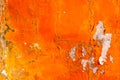 Orange color painted on concrete wall are peeling. Old and dirty wall texture background Royalty Free Stock Photo