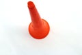 A orange color plastic vuvuzela horn isolated on white background