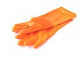 Orange color rubber gloves for cleaning on white background, housework concept Royalty Free Stock Photo