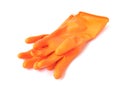 Orange color rubber gloves for cleaning on white background, housework concept Royalty Free Stock Photo