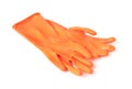 Orange color rubber gloves for cleaning on white background, housework concept Royalty Free Stock Photo