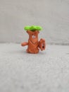 Orange color smiling kids toy