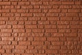 Orange colored brick wall texture, architecture building, masonry of stone blocks background Royalty Free Stock Photo