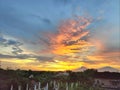 Orange colored evening sky, Amazing Sunset Clouds Background. Royalty Free Stock Photo