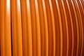 Orange colored fiber optic cable for laying in underground Royalty Free Stock Photo