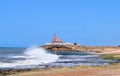 Orange Colored Hindu Temple at Coastal Beach with High Rising Ocean Waves - Arabian Sea, Chorwad, Gujarat, India