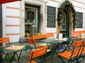 Orange Colored Outdoor Seating of a Cozy Cafe