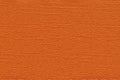 Orange colored plain textured cardstock background image. Royalty Free Stock Photo
