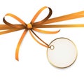 orange colored ribbon bow with hang tag Royalty Free Stock Photo