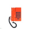 Orange colored vintage telephone